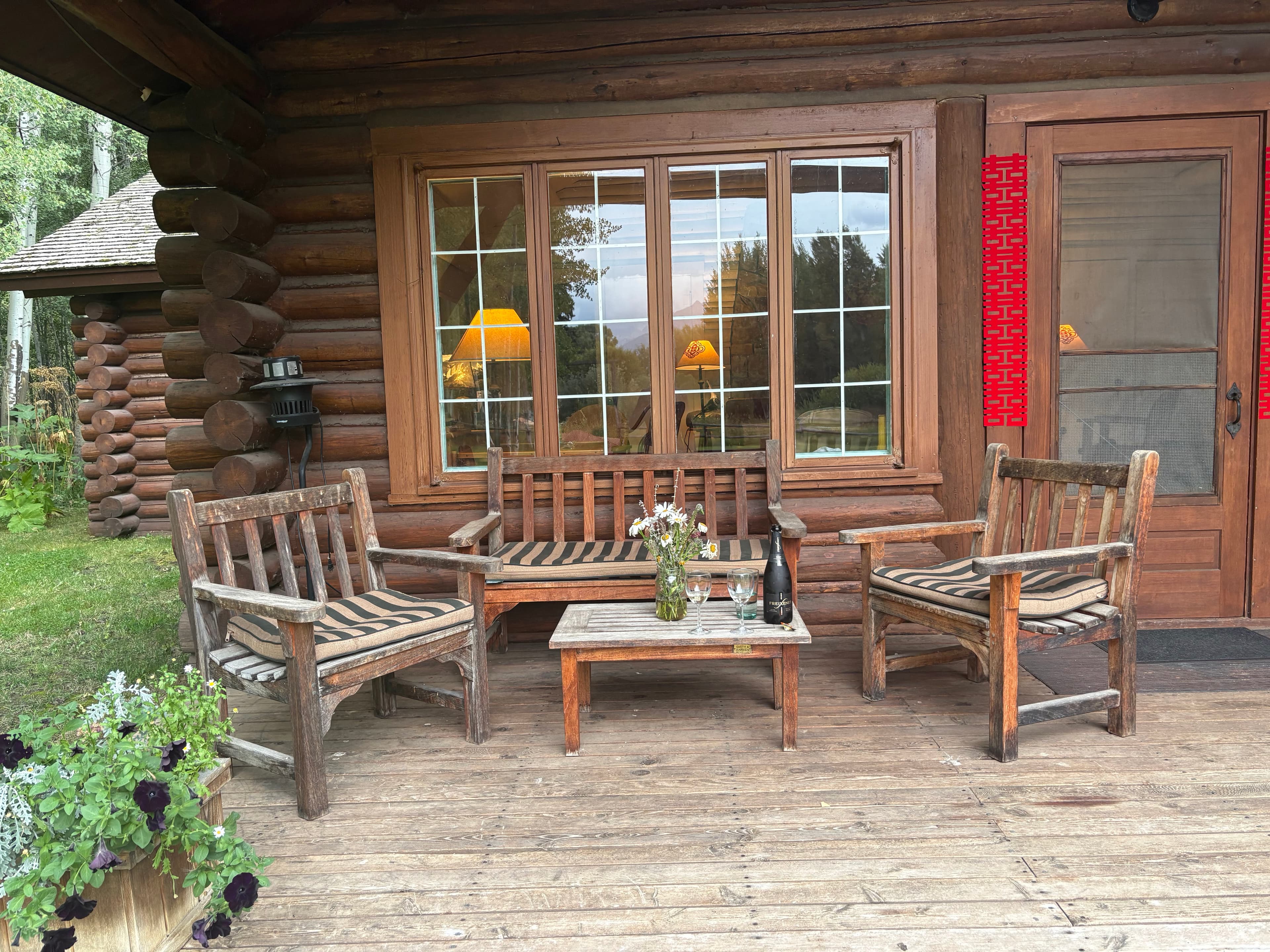 Cabin porch with rustic seating